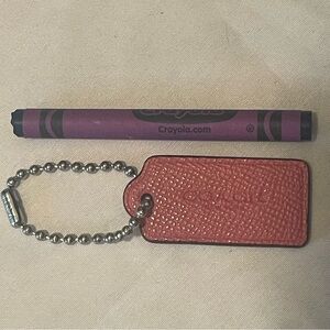 Coach pebbled Mauve Leather hang tag